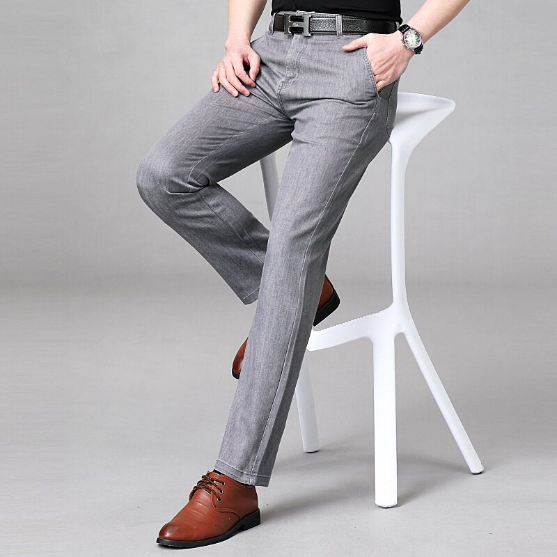 新款弹搭力直筒大码牛仔裤潮男牌修身经典百修身通勤男长裤子