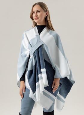 Color blocked and striped shawl, draped over a woman's