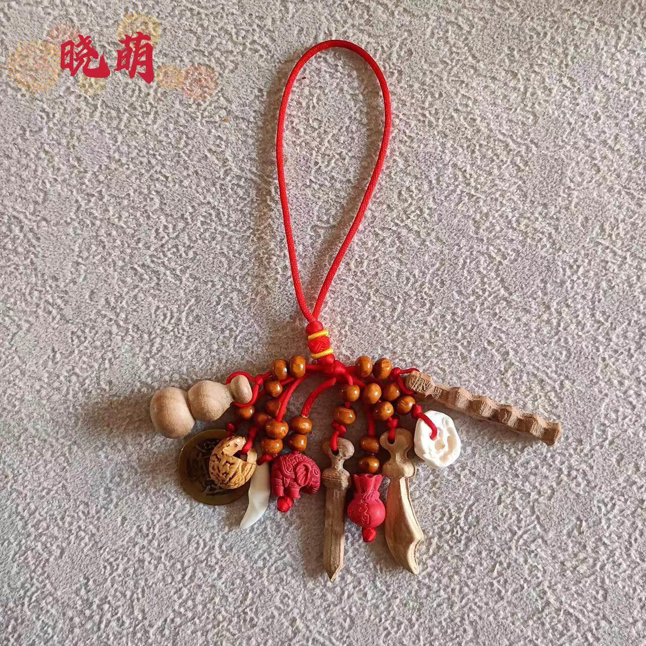 厂家红绳桃木挂件狗牙葫芦铜钱桃木剑纯手工编制