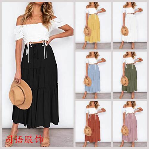 Women's high waisted mid length skirt with a wind shaped