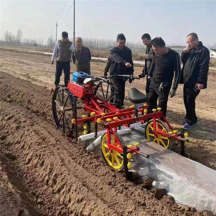 农用拱棚铺膜机小型拱型铺膜机器拖拉机带盖膜机