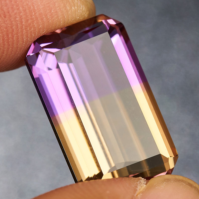 批发源头捡漏价 9.65克拉紫黄晶裸石戒面切工火彩好 支持私人定制