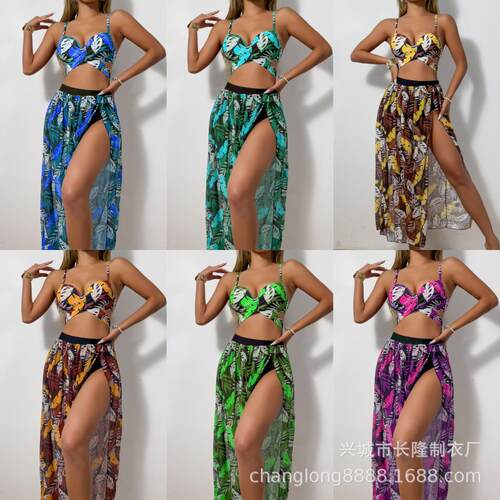 Split swimsuit with three long skirts and crossed chest