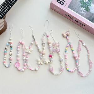 新款高颜值粉色系甜美手机链串珠蝴蝶结手机壳挂件耳机套挂链