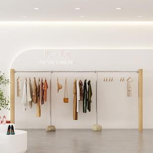 女装店货架店铺装修设计服装架实木衣服架服装店展示架落地陈列架