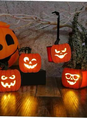 Halloween pumpkins carry small night lights and glow lantern
