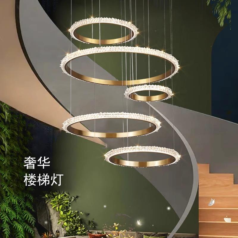 别墅高档楼梯吊灯设计师现代轻奢楼中楼水晶圆圈复式楼中空大吊灯
