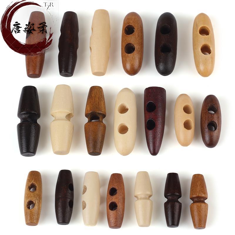 3cm4cm橄榄形木质纽扣 单孔两孔木头扣 箱包服装装饰童装牛角扣子