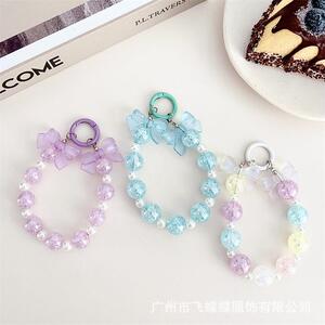 新款夜光蝴蝶结爆裂珠手机链串珠炫彩手机壳钥匙扣耳机套挂链
