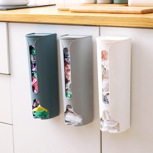 Wall-mounted plastic bag dispenser and storage box for the k