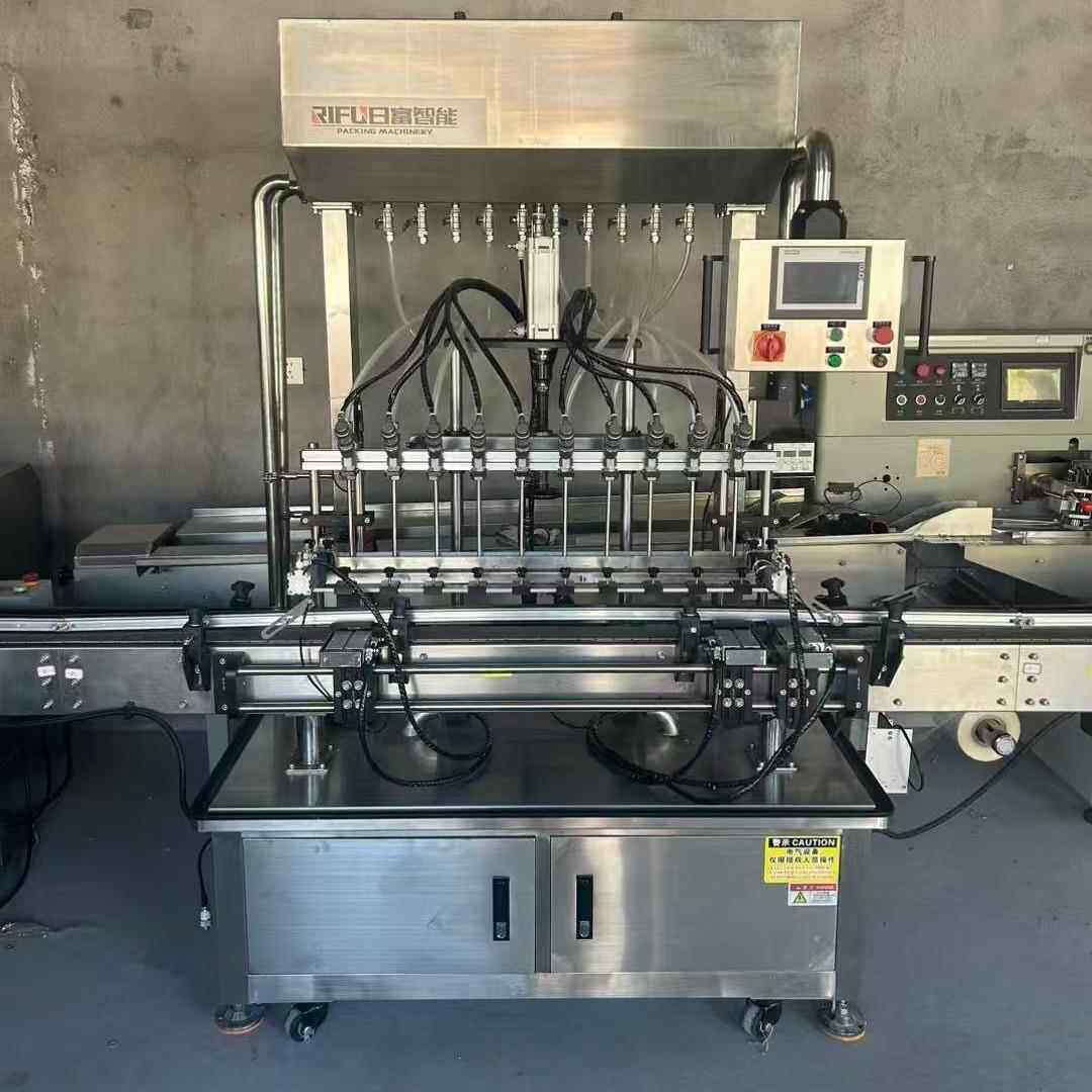 出售广州日富液体灌装机地板清洁剂油污净灌装机旋盖机贴标机