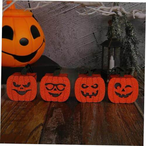 Halloween pumpkins carry small night lights and glow lantern