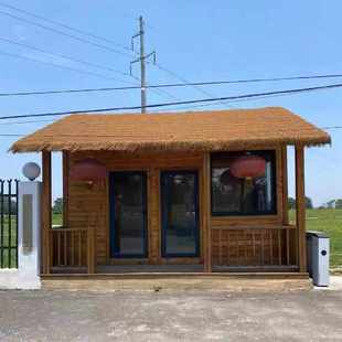 网红庭院茅草木屋民宿别墅户外防腐木房子日式阳光房茶室仿古凉亭