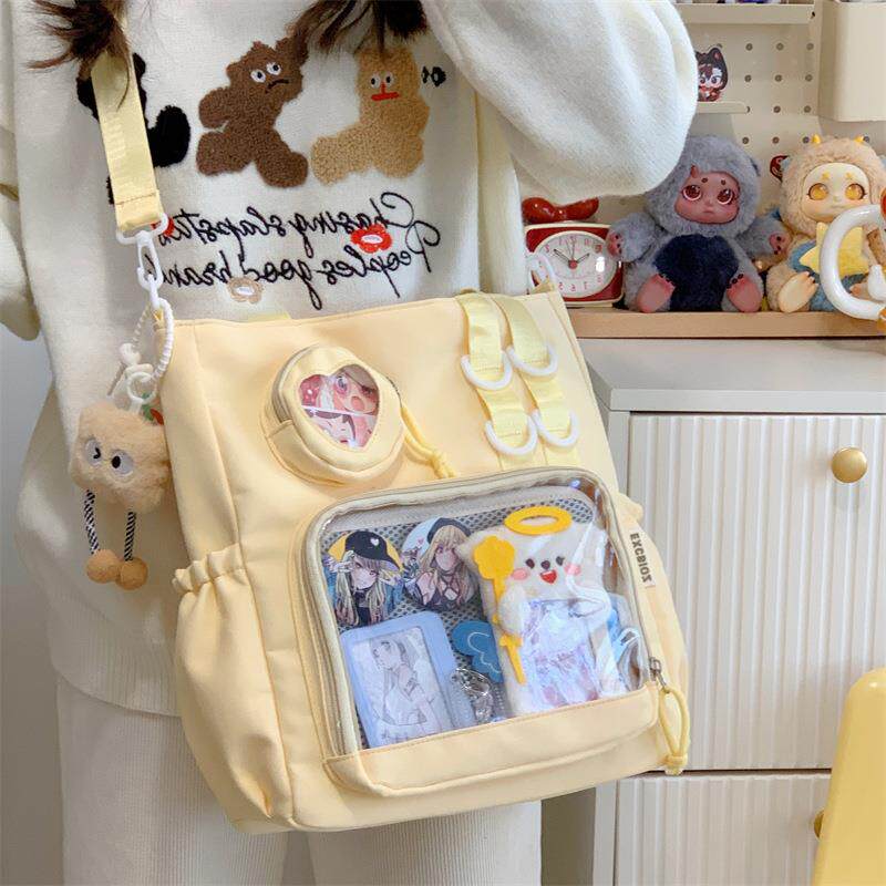 学院风百搭简约大容量上课装书邮差包女透明吧唧单肩斜挎娃包痛包