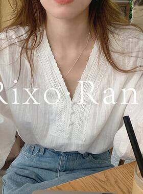 法国Rixo Rane温柔蕾丝花边拼接设计V领包边扣宽松泡泡袖衬衫上衣