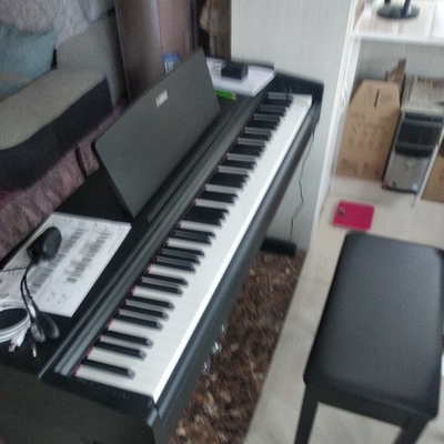 雅马哈电钢琴ydp143b究竟质量怎么样？要将近六千值这个价吗？