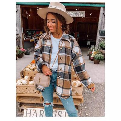 Long sleeved collared women's checkered shirt mid length