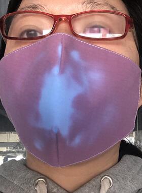 Temperature sensitive, breathing, color changing mask when