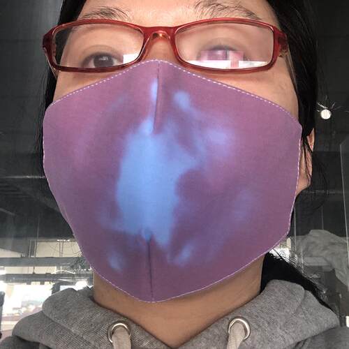 Temperature sensitive, breathing, color changing mask when