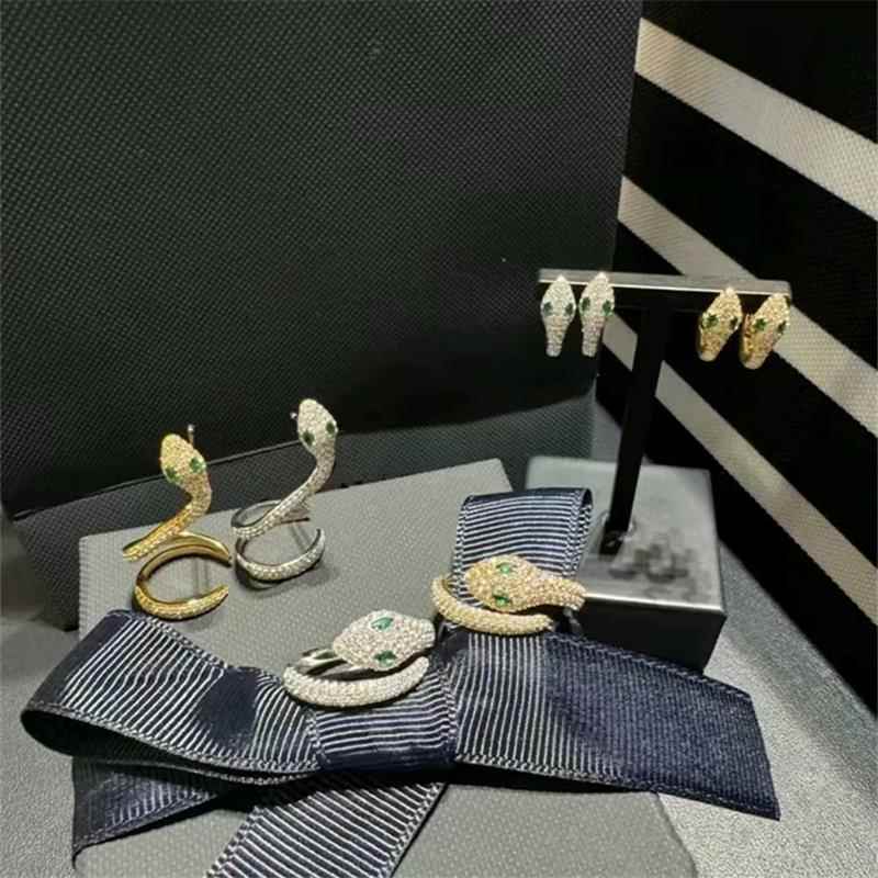 金色灵蛇戒指女金黄色蛇形开口手镯耳钉异域欧美气质小众轻奢礼物