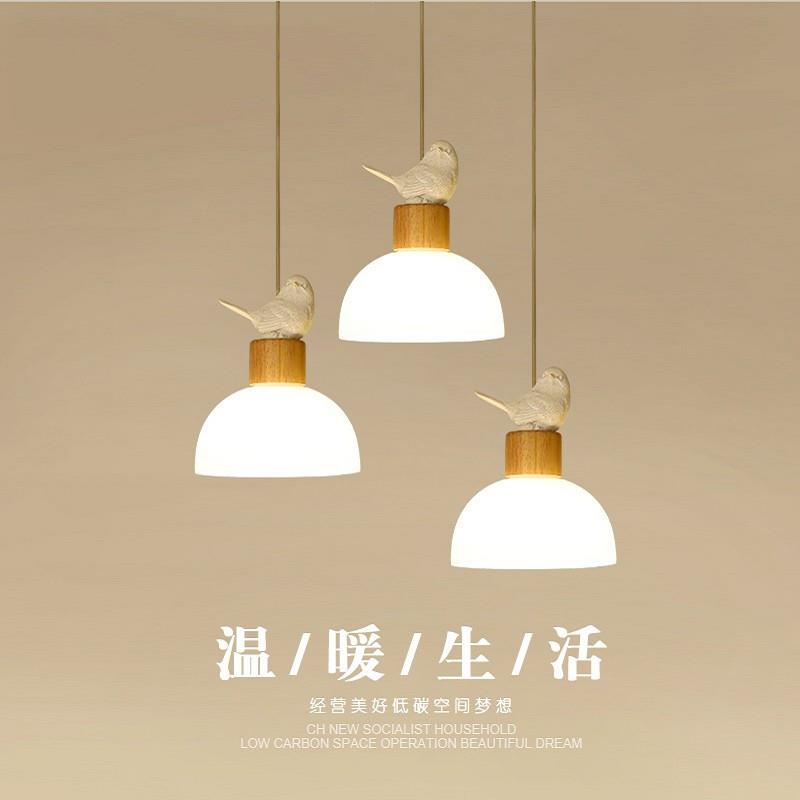 新款直销北欧卧室床头吊灯小鸟实木长线单头吧台餐厅灯日式原木床