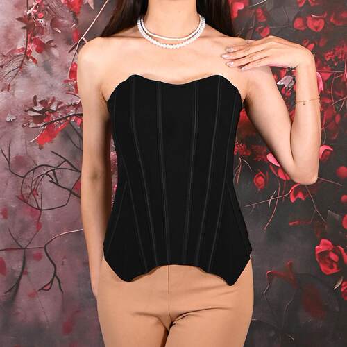 Bagged waist cinching black and white shapewear, belly