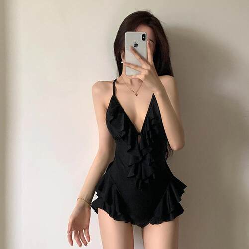Swimsuit with deep belly coverage and slimming lace
