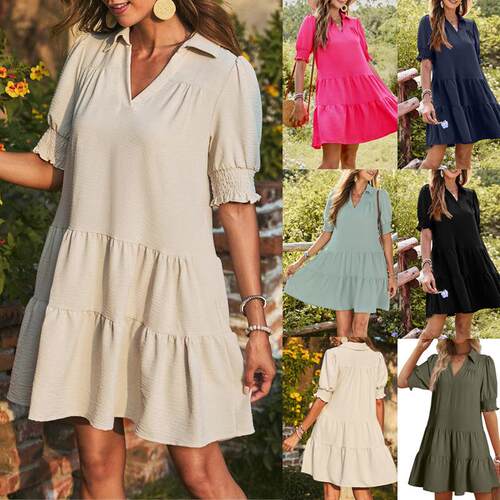 A women's solid color pleated V-neck spliced sleeve dress