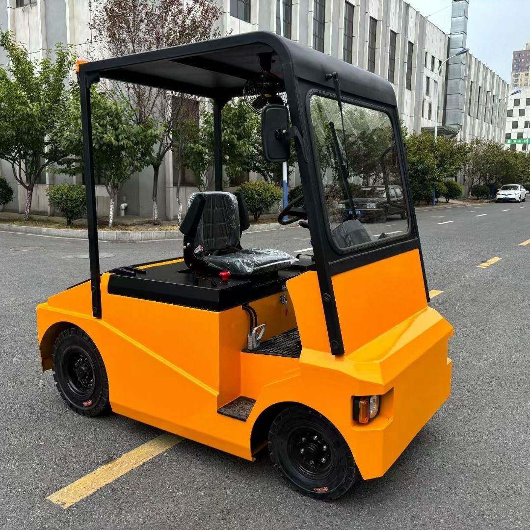 Electrictowtractor座驾电动牵引车QDD拖车机场牵引头平板挂车