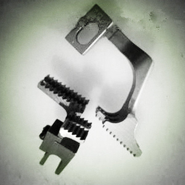 工业缝纫机台湾宝狮600包缝机配件600拷边机锁边机牙齿一套