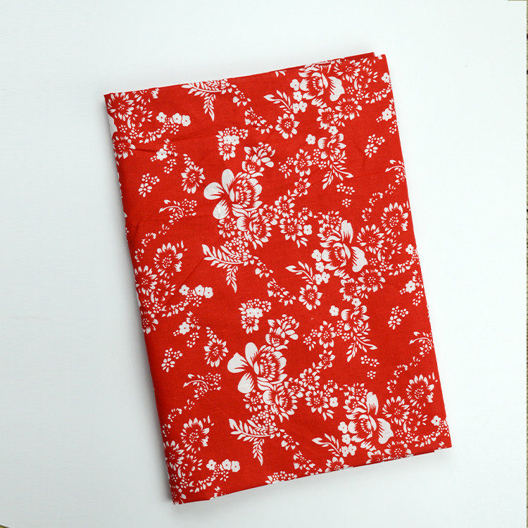 机制红印花布牡丹花 红底白花  服装抱枕布 茶馆餐饮桌布 装饰布