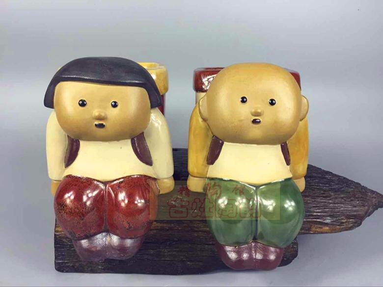 陶瓷工艺品石湾公仔家居装饰品礼品创意摆件花盆笔筒背包娃娃促销