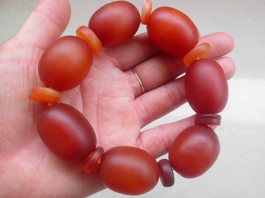 促销红缠丝玛瑙桶珠南红色玉髓