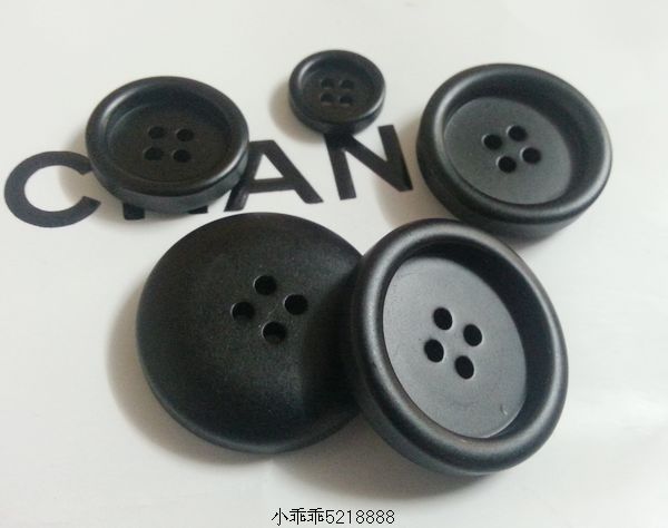 服装纽扣风衣扣子进口台湾亚光黑色四眼扣15-30MM