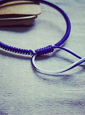 蓝白手工红绳情侣款转运金刚结