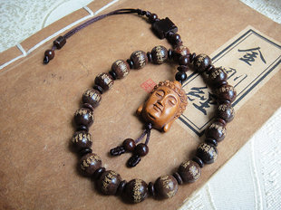 马狮麟紫檀木车挂 紫檀木刻心经配黄杨木释迦摩尼佛吊坠挂件