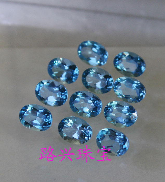 【路兴珠宝】 椭圆形5*7mm 蓝黄玉、托帕石   18元一粒