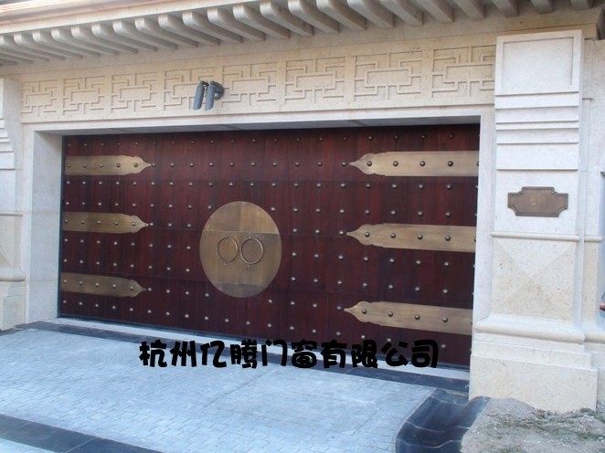 杭州正品实木上滑门 铝木门 钢木门 木质车库门亿腾门业