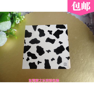 厂家直销/牛奶瓶盖膜/黑白花衬纸/西点垫纸/塑料纸/500张促销