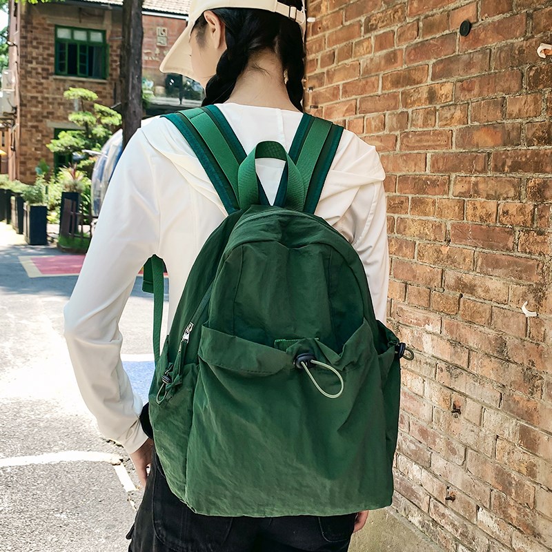 墨绿色双肩包设计感小众小型旅游背包女2024新款轻U量化运动小书