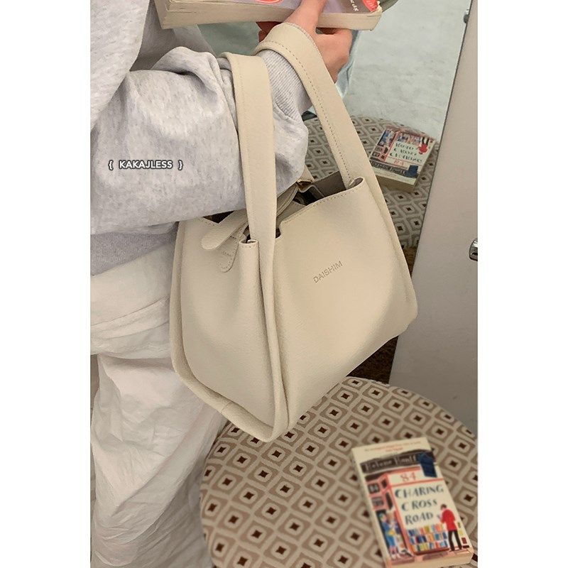 菜篮子包包女2025新款春季时尚手提水桶包百搭通勤单肩斜挎包,箱包皮具/热销女包/男包,水桶包,淘宝优惠券,粉丝福利购,淘宝优惠卷