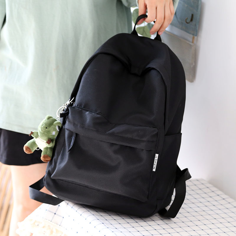 大容量牛津布防水双肩包男纯色书包女大学生背包女双肩黑色百搭