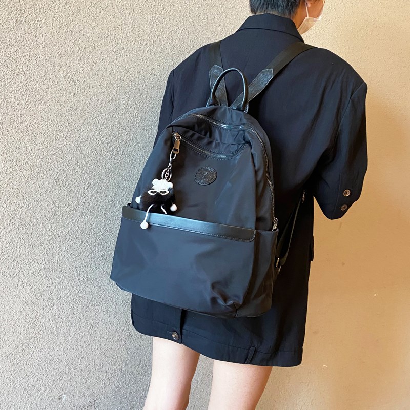 休闲旅游大背包2024新品女士轻薄百搭通勤包包防雨牛津布双肩包潮