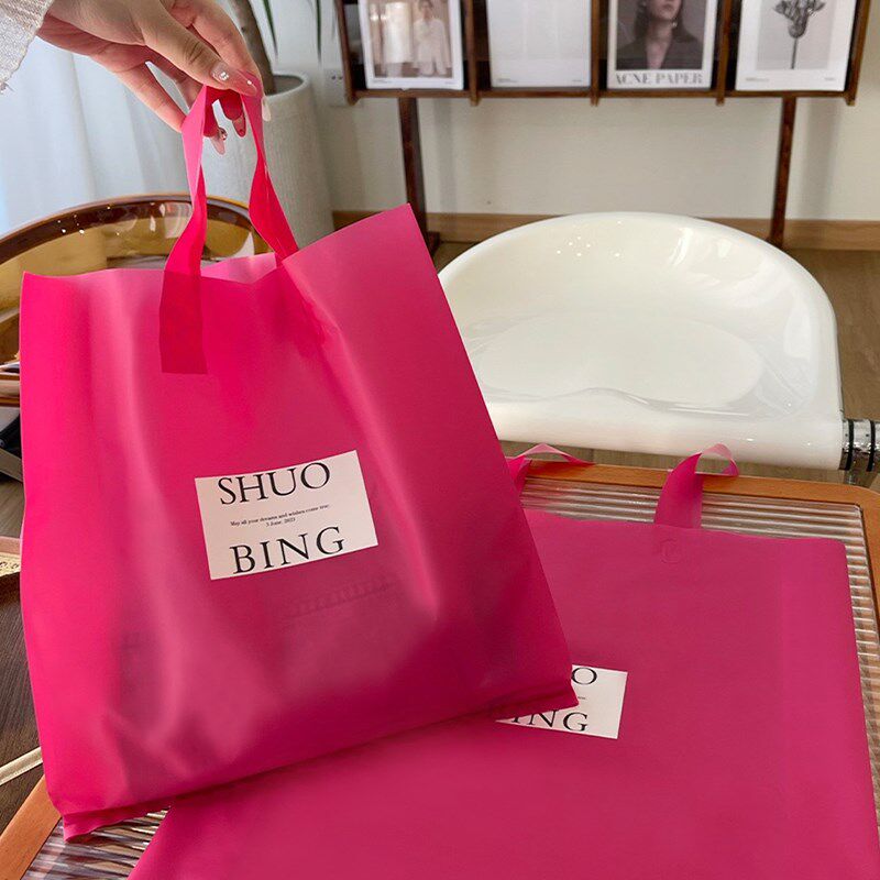 新品高档服装店磨砂塑料手提袋女装衣服打包袋礼品包装袋定制
