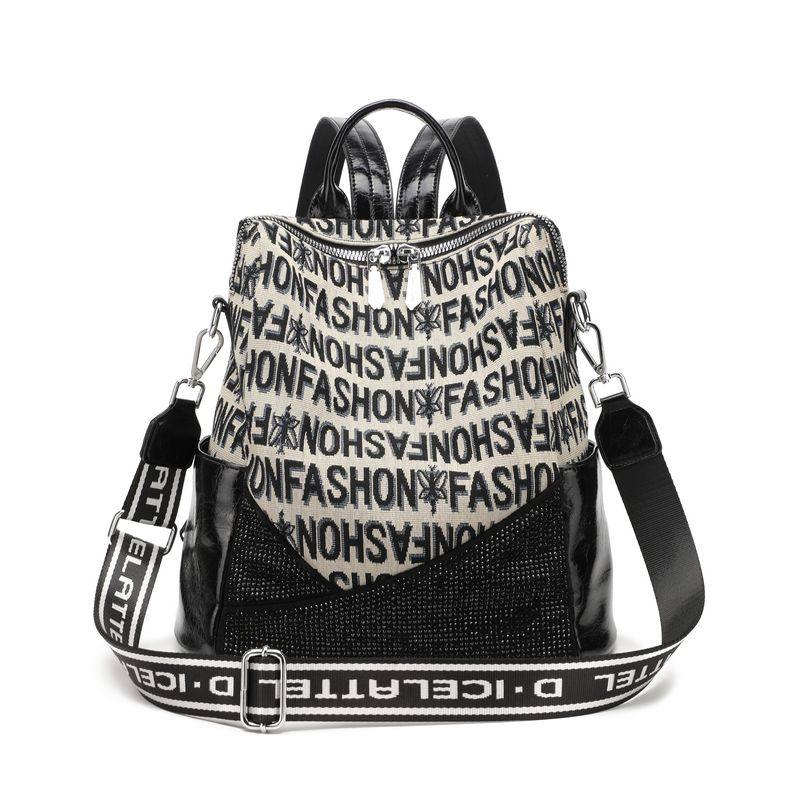 时尚帆布双肩包女2023新款潮流刺绣烫钻通勤背包高级感小众旅行包