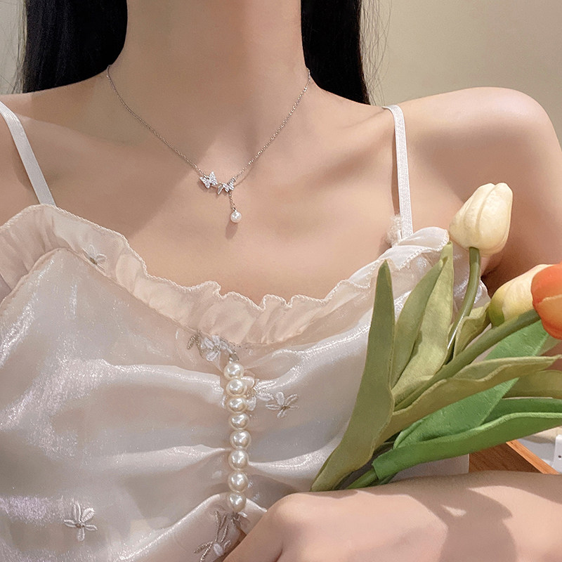 现货银色钛钢高级感蝴蝶结项链女夏小众设计珍珠吊坠锁V骨链2022