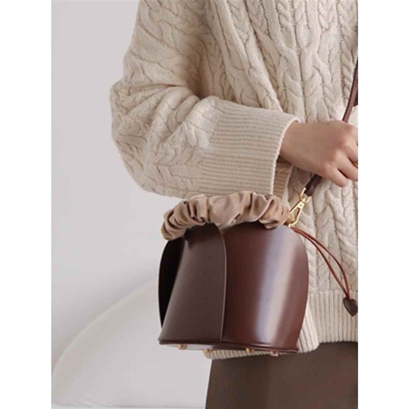 高奢感斜挎女士包包女2025新款小众菜篮子水桶包时尚单肩手提女包,箱包皮具/热销女包/男包,水桶包,淘宝优惠券,粉丝福利购,淘宝优惠卷