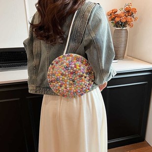 小众设计斜挎草编包女2025新款海边度假沙滩包编织帽子包珍珠包包