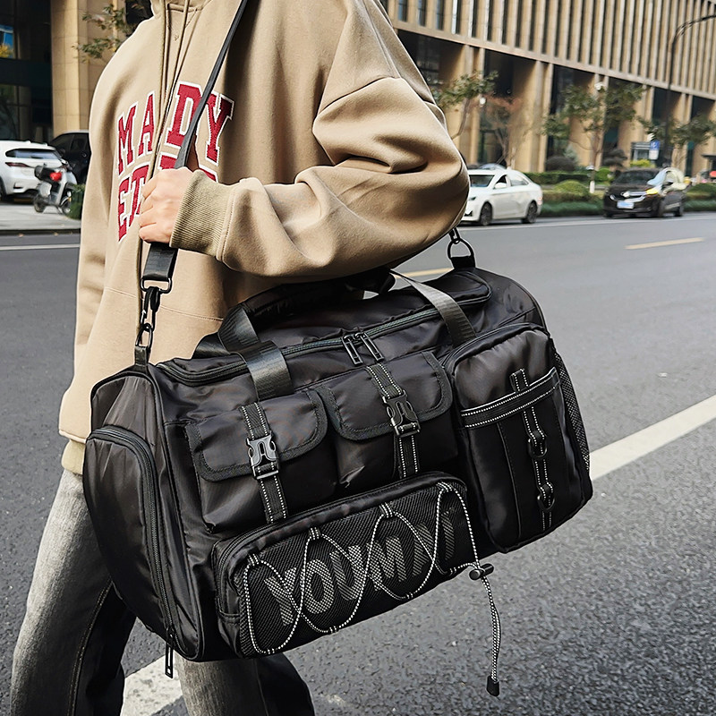 男士休闲旅游包短途外出旅行包轻便双肩包大容量黑包防水行李包男