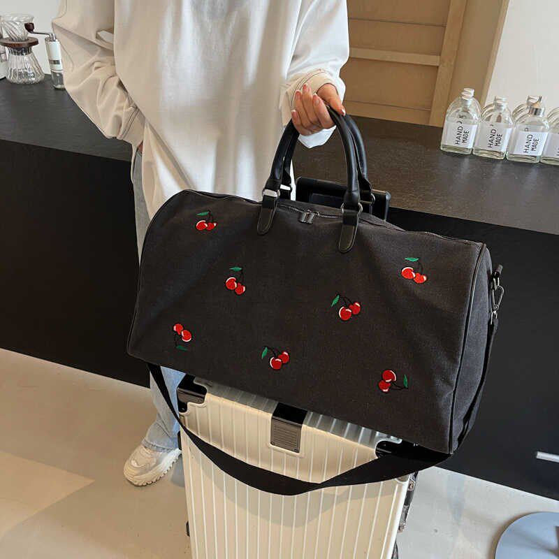 旅行包女大容量轻便超大帆布学生行李袋手提旅游包收纳待产包袋